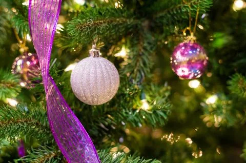 Christmas decorations on a tree Stock Photos