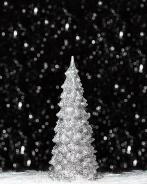 Christmas decorations view of silver tree on dark background with silver Stock Photos