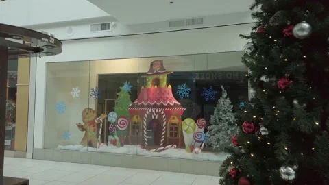 Christmas decorations in a window display of a closed store Stock-Footage 162776327