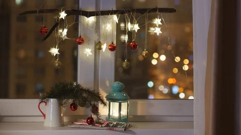Christmas decorations on a window sill Stock Footage 79836648