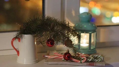 Christmas decorations on a window sill Stock Footage 82044161