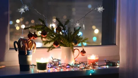 Christmas decorations on a window sill Stock Footage 89410722