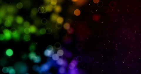 Christmas digital glitter sparks multi color particles bokeh flowing on color Stock Footage 86557130