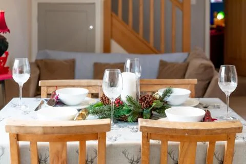 Christmas dining table setup theme Stock Photos
