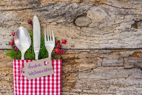 Christmas dinner table place setting, holidays background Stock Photos