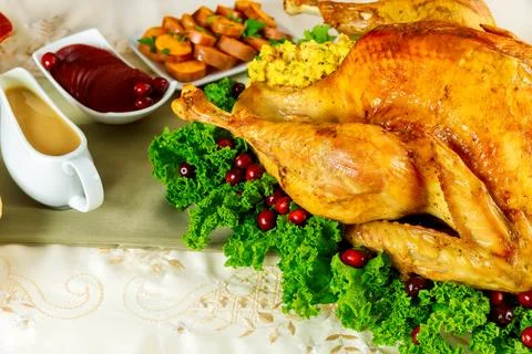 Christmas dinner turkey stuffed with cornbread mix. Stock Photos