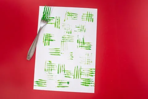 Christmas DIY tutorial showing how to create decorative stamps with a fork .. Stock Photos