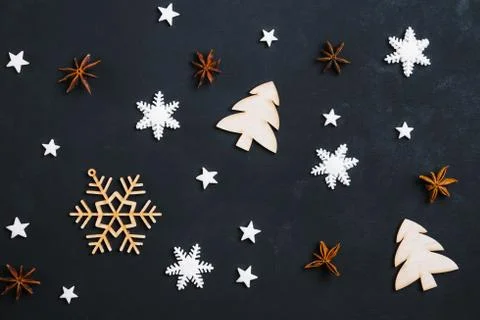 Christmas elements on dark background, flat lay Stock Photos