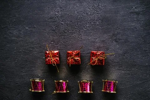 Christmas elements on dark background, flat lay Stock Photos