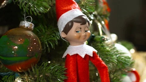 Christmas Elf on tree Blinks twice Video stock 82972509