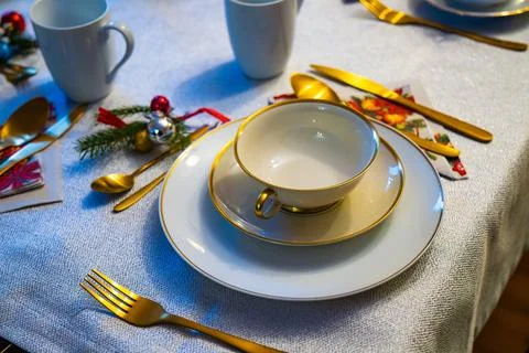 Christmas Eve table setting with elegant decorations for a festive gathering Stock Photos