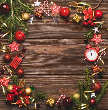Christmas festive layout frame red balls toys bells green branches spruce Stock Photos