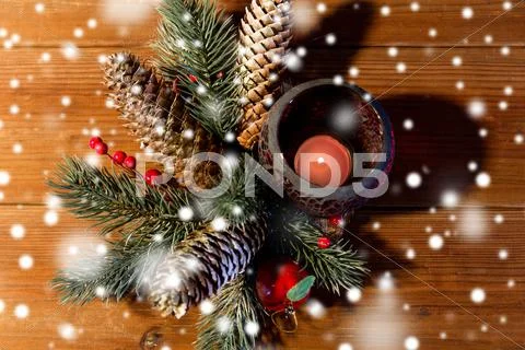 Christmas fir branch decoration and candle lantern Stock Photos