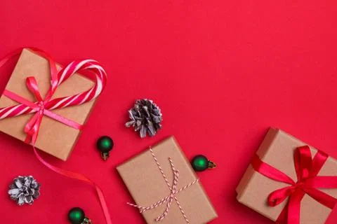 Christmas flat lay with gift boxes and pine cones Stock Photos