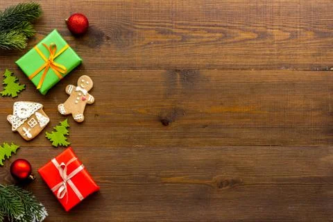 Christmas flat lay with gift boxes and icing gingerbread cookies, top view Stock Photos