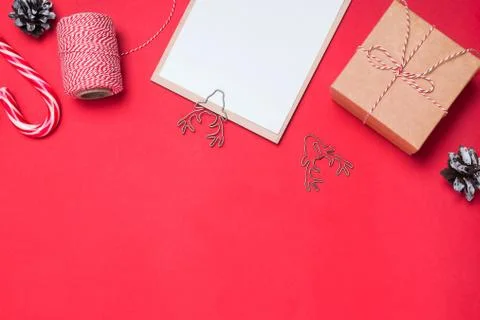 Christmas flat lay with giftbox, candy cane and other accessories Stock Photos