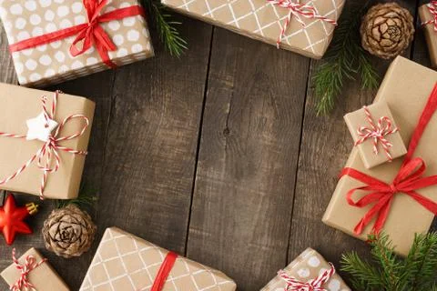 Christmas frame background with gift boxes, toys and decoration. Stock Photos