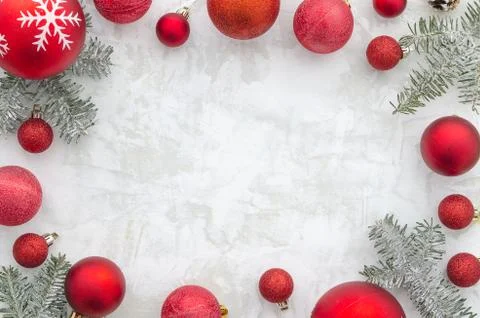 Christmas frame background with red balls decor and fir tree. on white Stock Photos