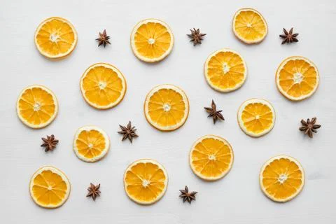 Christmas frame composition with dry oranges and anise stars and seeds Stock Photos
