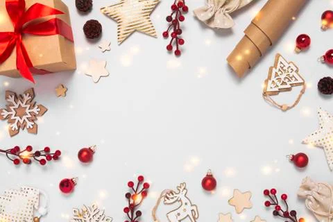 Christmas frame with decorations on gray background Stock Photos
