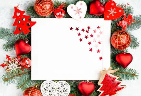 Christmas frame is surrounded by branches of a New Year tree Christmas decora 库存照片