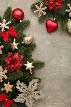 Christmas frame - tree branches with red and gold baubles, stars, snowflakes  Stock Photos