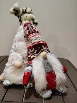 Christmas funny cute two gnomes next to each other on the table close-up Foto stock