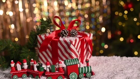 Christmas gift and soft bokeh lights with warm holiday spirit. Stock Footage 346027967