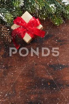 Christmas gift box and xmax fir tree Stock Photos