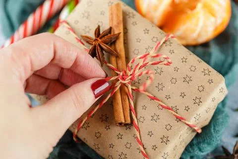 Christmas gift box, candy cane, tangerines Stock Photos
