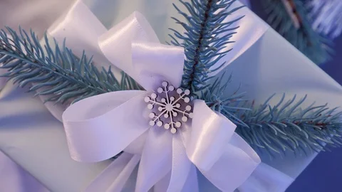 Christmas gift box. Gift box with white ribbon. Top view. Stock Footage 122108713