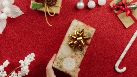 Christmas gift box on red background Stock Footage 218355263