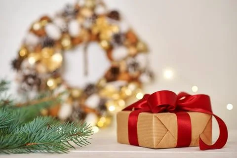 Christmas gift box with ribbon and christmas decorations Stock Photos