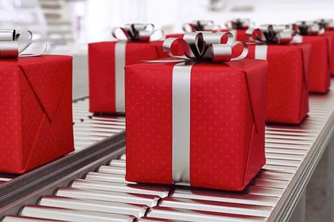 Christmas gift boxes on conveyor rollers ready to be shipped by courier for.. 写真素材