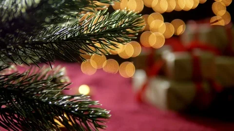 Christmas gift boxes decoration with red scarf on gold bokeh lights background Stock Footage 81087053