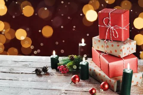 Christmas gift boxes with decoration on the table Stock Photos