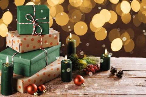 Christmas gift boxes with decoration on the table Stock Photos
