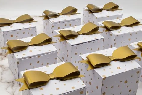 Christmas gift boxes isolated on marble background. Stock Photos