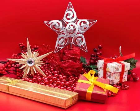Christmas gift boxes isolated on red background. Christmas celebration Stock Photos