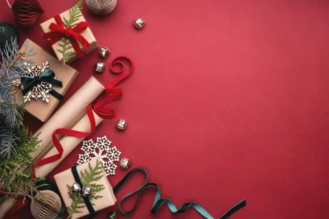 Christmas gift boxes on red background. Stock Photos
