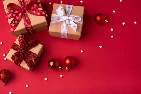 Christmas gift boxes with red balls. Stock Photos