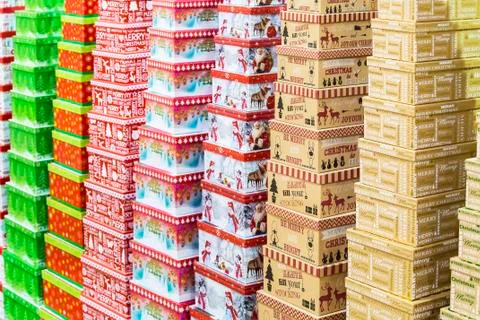 Christmas gift boxes standing in rows. Stock Photos