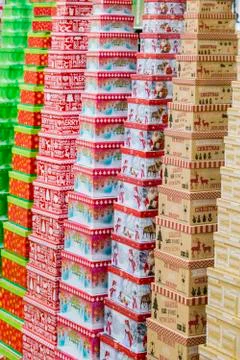 Christmas gift boxes standing in rows. Stock Photos
