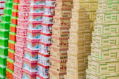 Christmas gift boxes standing in rows. Background texture of winter gifts Stock Photos
