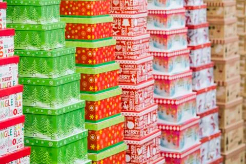 Christmas gift boxes standing in rows. Background texture of winter gifts Stock Photos