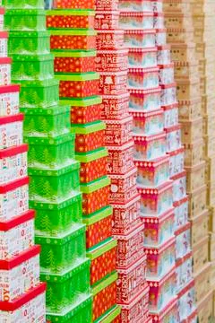 Christmas gift boxes standing in rows. Background texture of winter gifts Stock Photos
