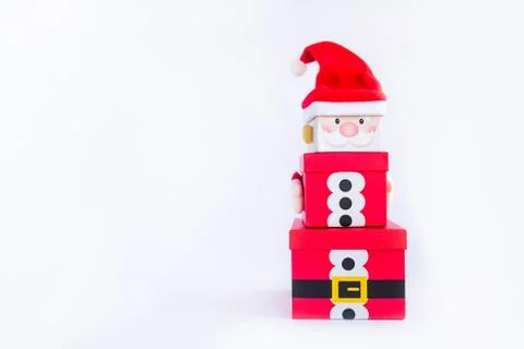 Christmas gift boxes tower in the shape of a Santa Clause on white background Foto stock