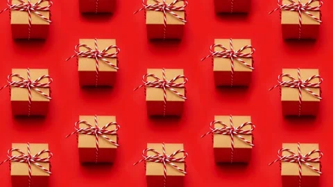 Christmas gift on a colored red background. New Year, holiday, give, pack 動画素材 144525514