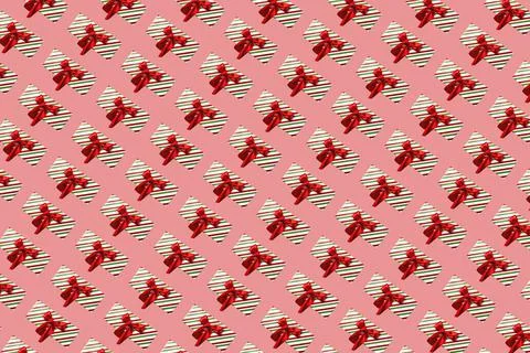 Christmas gift pattern pink background little fragments Stock Photos