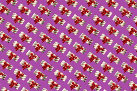 Christmas gift pattern purple background Stock Photos